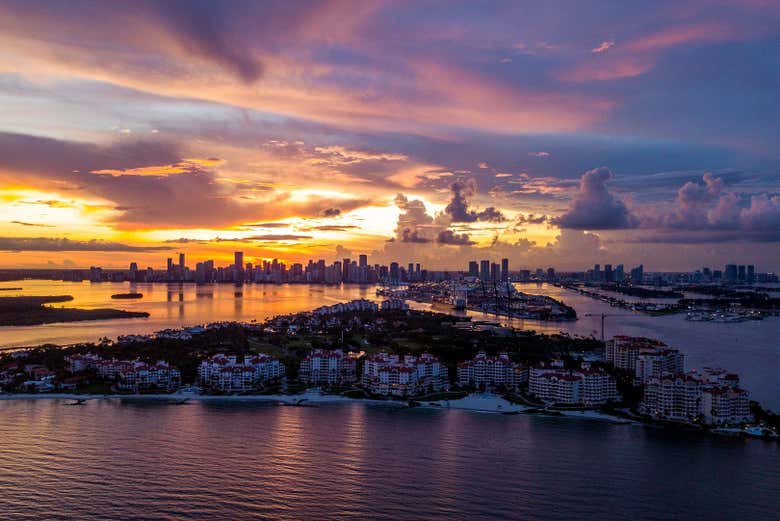See the sun set over Miami
